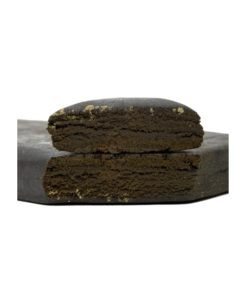 Two rectangular pieces of compressed material stacked vertically, showing a dense interior with a textured surface on a plain background.