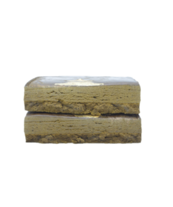 Two rectangular stacked pieces of light brown compressed material with a layered texture photographed on a plain background.